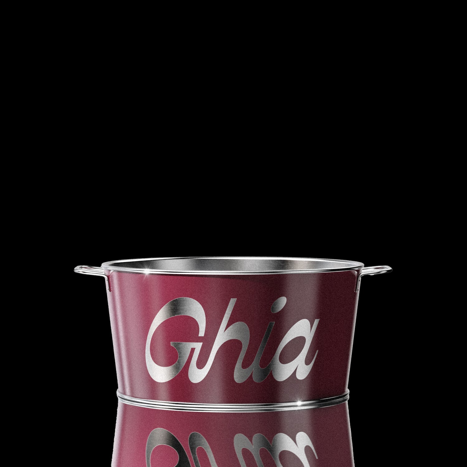 A burgundy Ghia-branded metal ice bucket with silver lettering and handles on both sides, reflecting light on its polished surface.