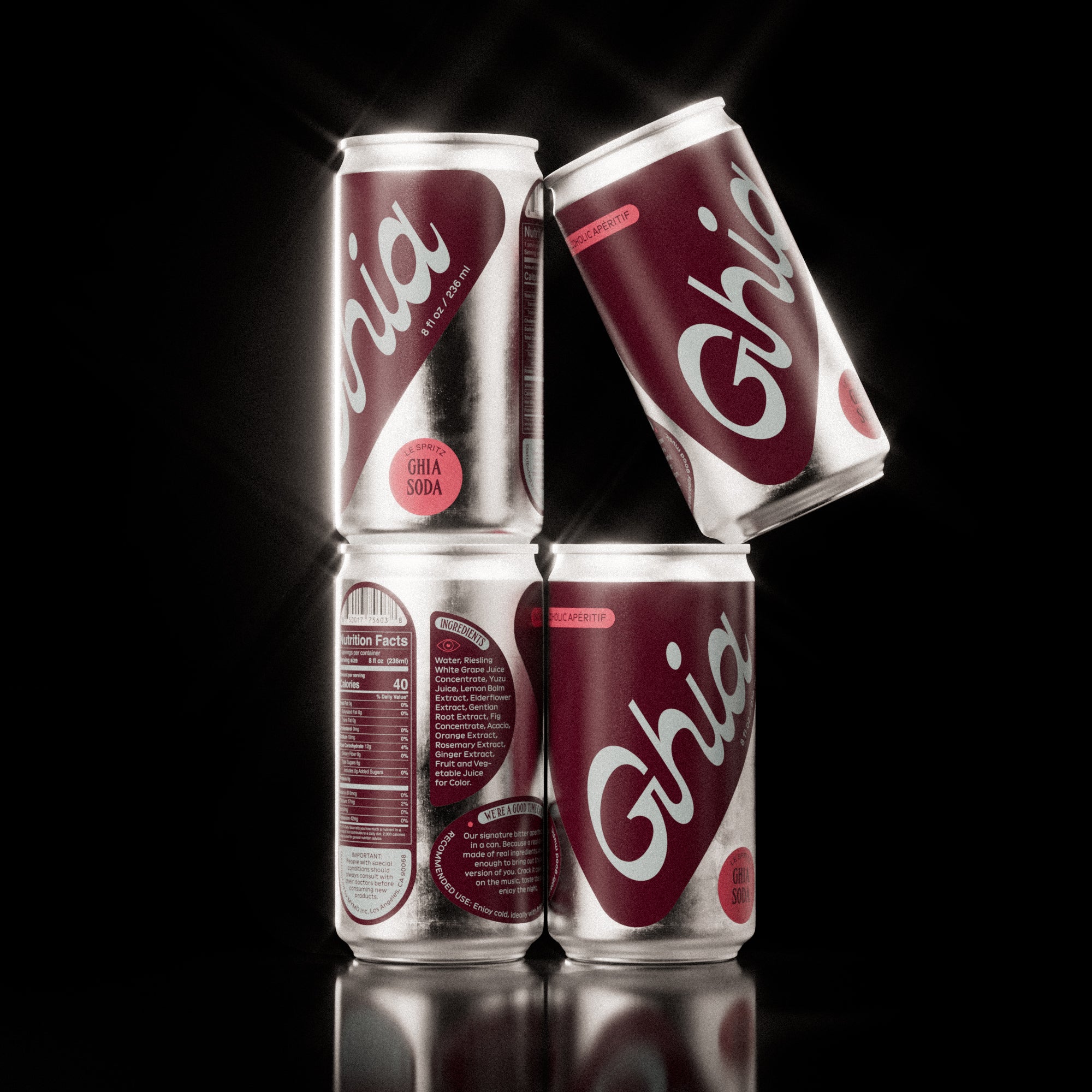 A pack of four Ghia Sumac & Chili non-alcoholic spritz cans stacked in a pyramid formation, with bold white branding, on a glossy black background.