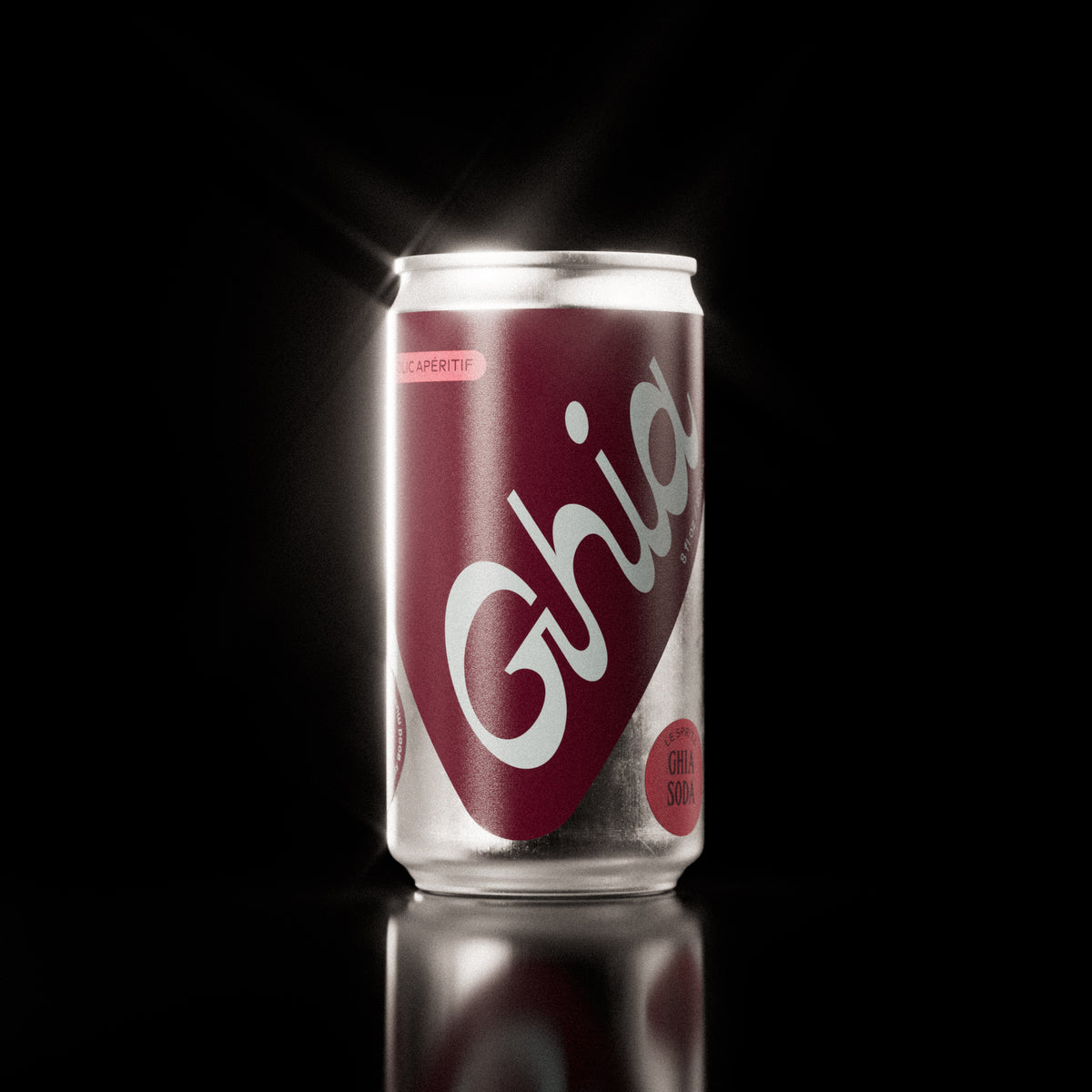 A Ghia non-alcoholic spritz can with a berry-colored label and bold branding on a silver aluminum body, featuring a non-alcoholic spritz beverage.