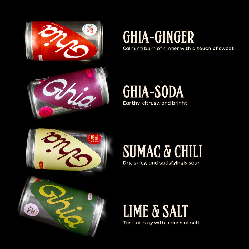 Four cans of Ghia non-alcoholic aperitif in different flavors: Ginger, Soda, Sumac & Chili, and Lime & Salt, with descriptions of each flavor’s taste on a black background.