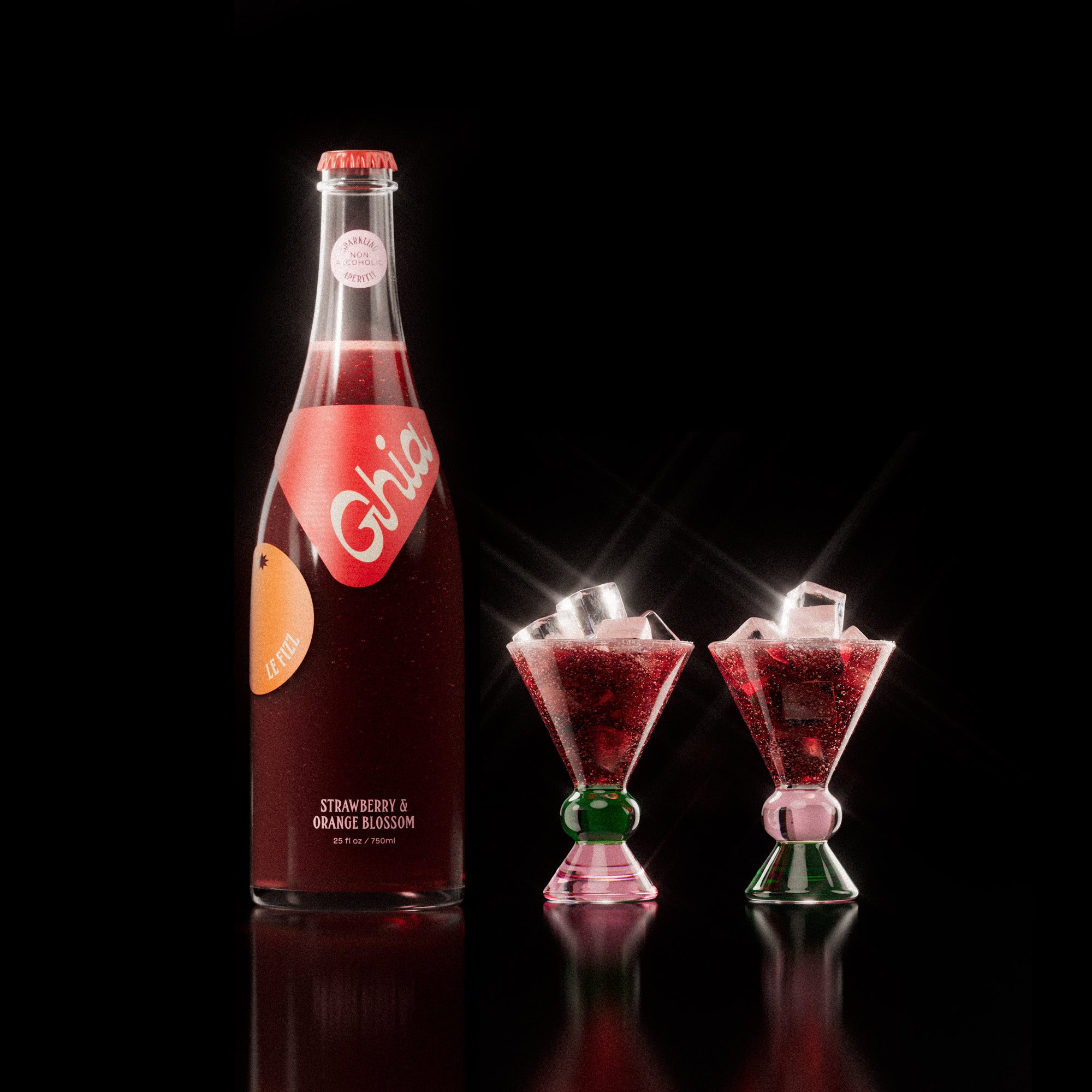 Non-alcoholic spritz in a bottle filled with a deep red strawberry and orange blossom beverage, featuring red labels. Alongside decorative cocktail glass that has a green and pink base.