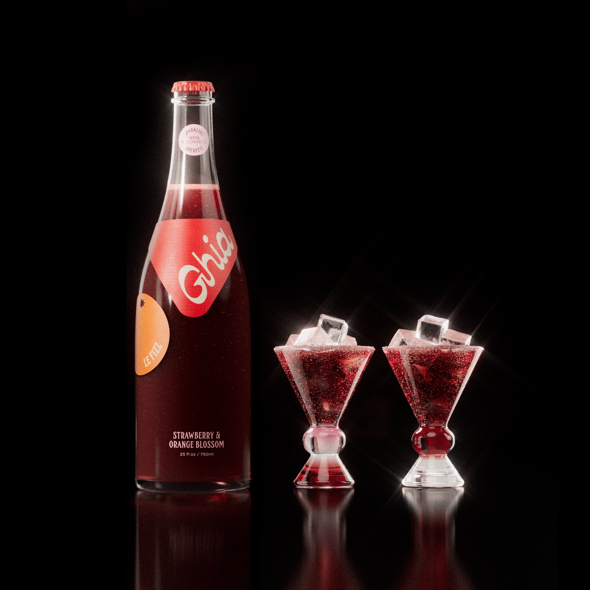 Non-alcoholic spritz in a bottle filled with a deep red strawberry and orange blossom beverage, featuring red labels. Alongside decorative cocktail glass that has a burgundy and clear base.