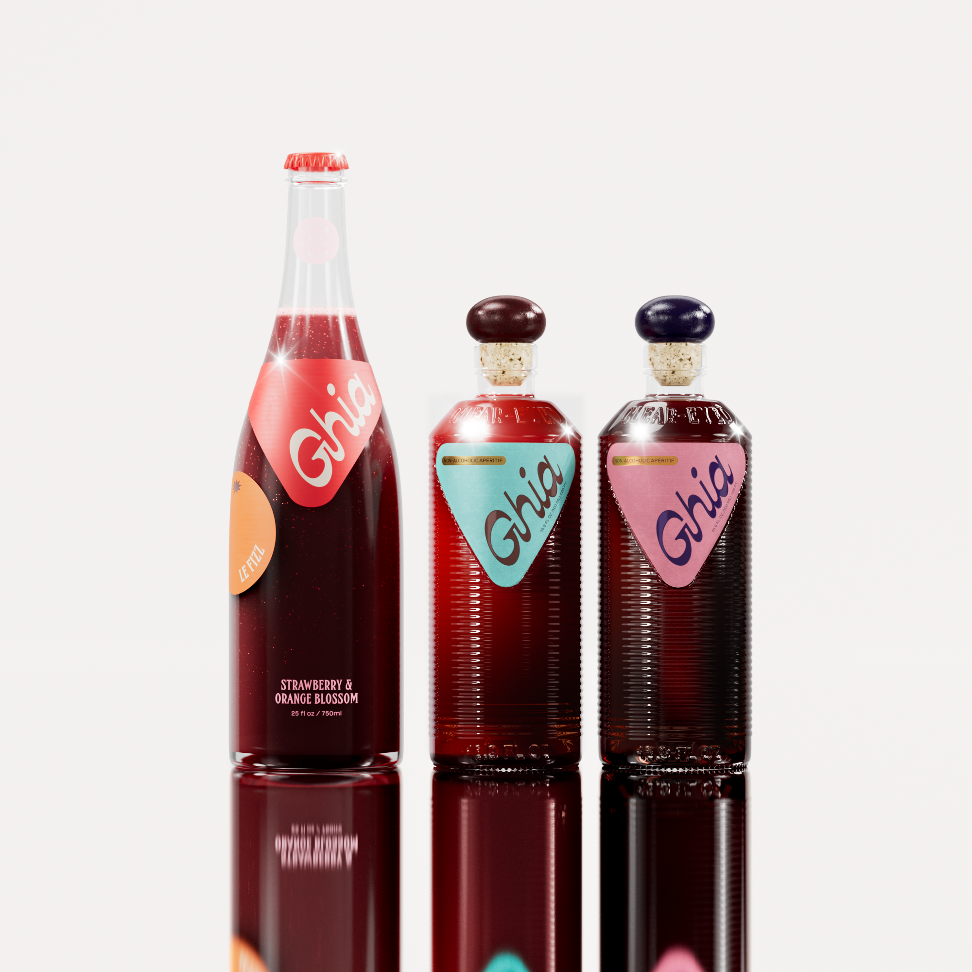 Ghia Bottle Bundle featuring a 750ml bottle of Le Fizz and two 500ml bottles of the Apéritif in Original and Berry flavors, arranged on a reflective white background. A non-alcoholic beverage set designed for mindful drinking.