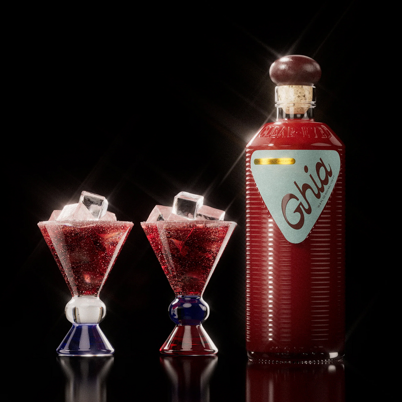 Ghia aperitif bottle beside two sculpted glasses of red spritz over ice with deep blue stems