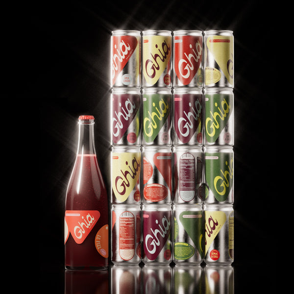 A variety of non-alcoholic spritz cans in vibrant flavors like Sumac & Chili, Ghia Soda, Ghia Ginger, and Lime & Salt, alongside a deep red glass bottle of an strawberry and orange blossom aperitif. A refreshing, alcohol-free beverage for mindful drinking.