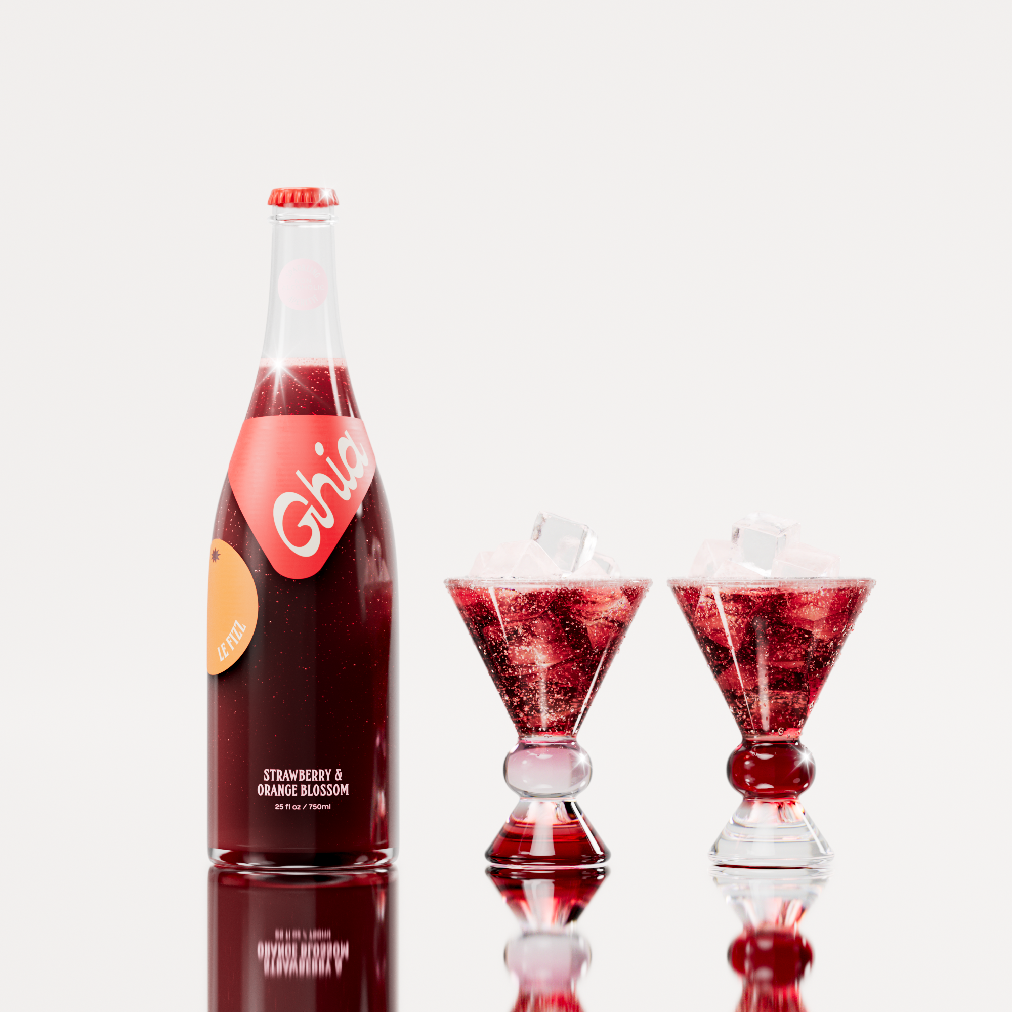 Non-alcoholic spritz in a bottle filled with a deep red strawberry and orange blossom beverage, featuring red labels. Alongside decorative cocktail glass that has a burgundy and clear base.